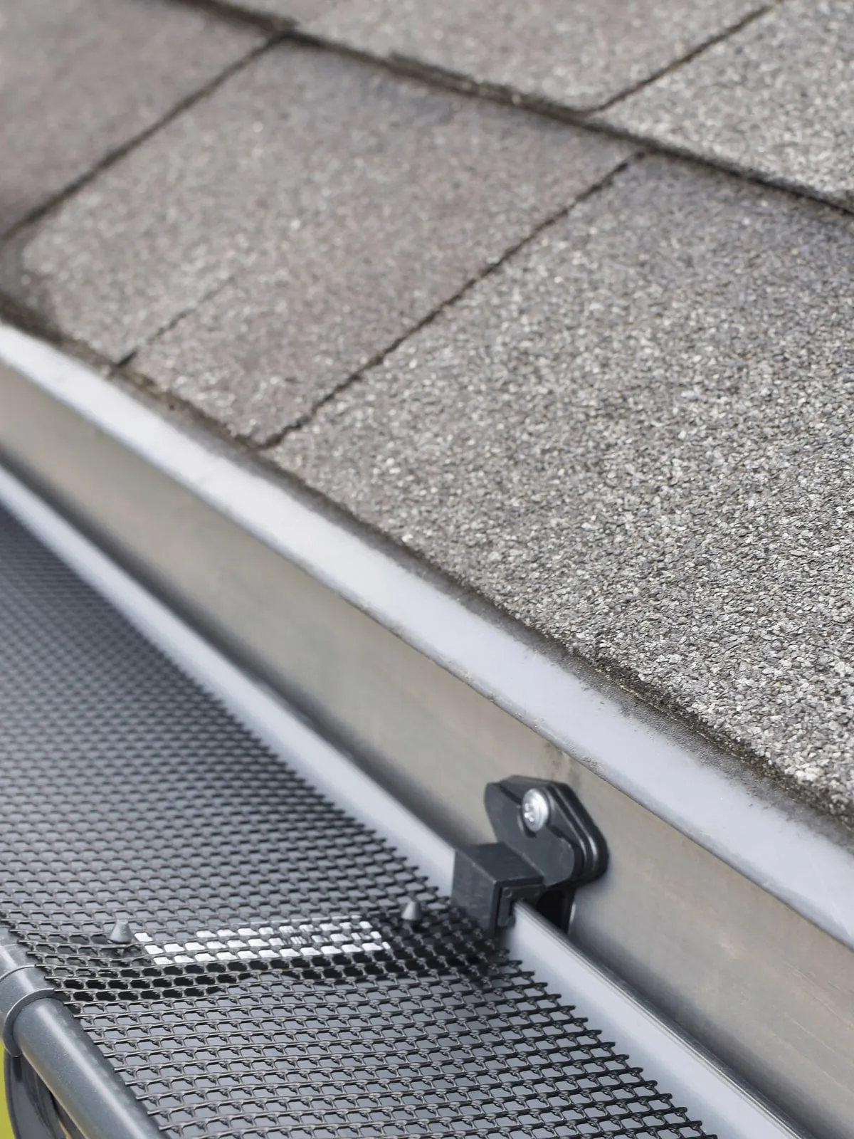 Gutter guard mesh installed over a seamless gutter