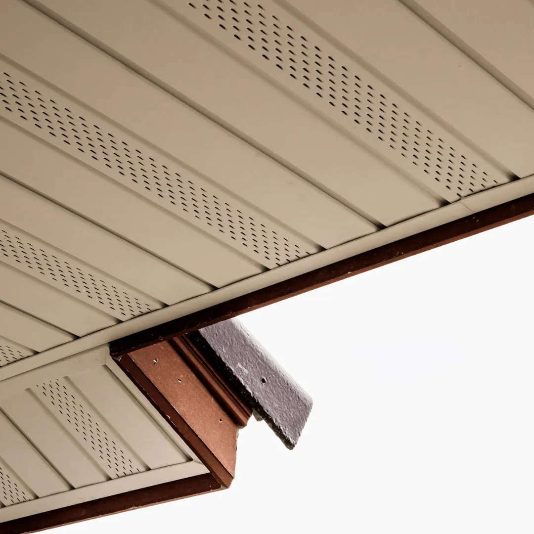 Vented soffit and fascia corner seen from below