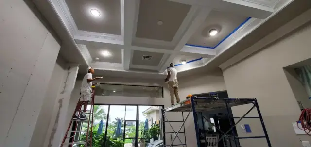 Excell crew building a coffered ceiling