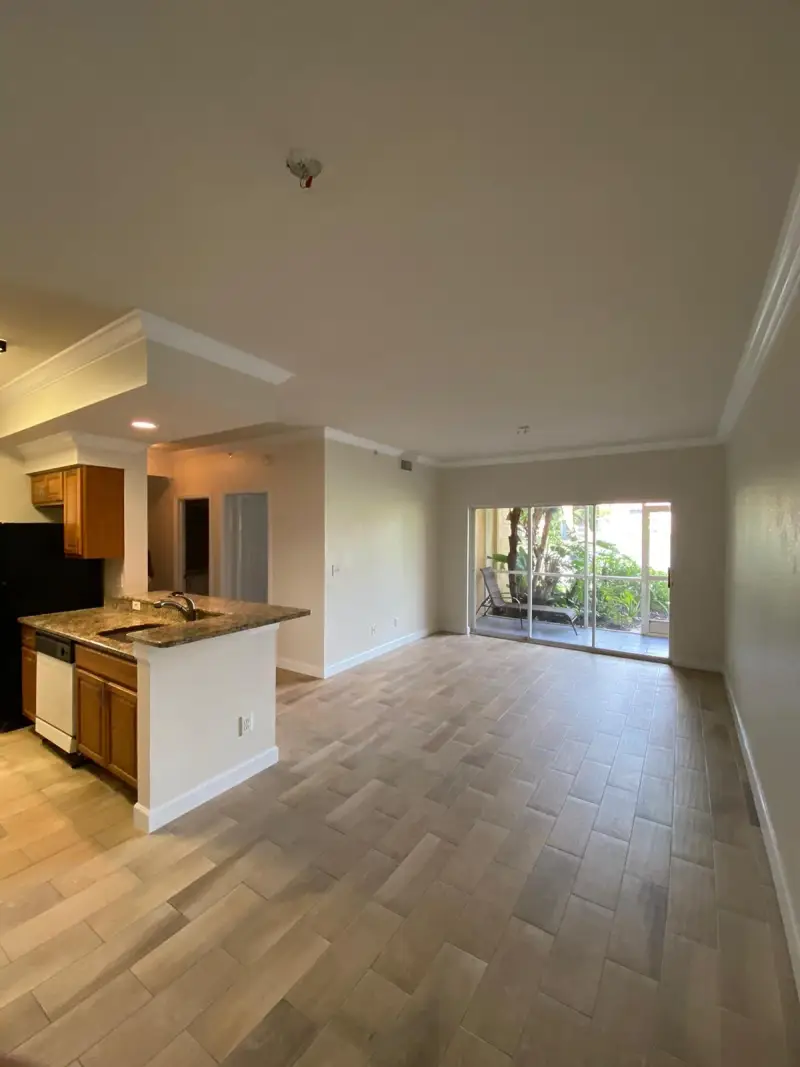 Condo living area with newly installed flooring